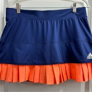 Blue and orange adidas tennis skirt with ruffle